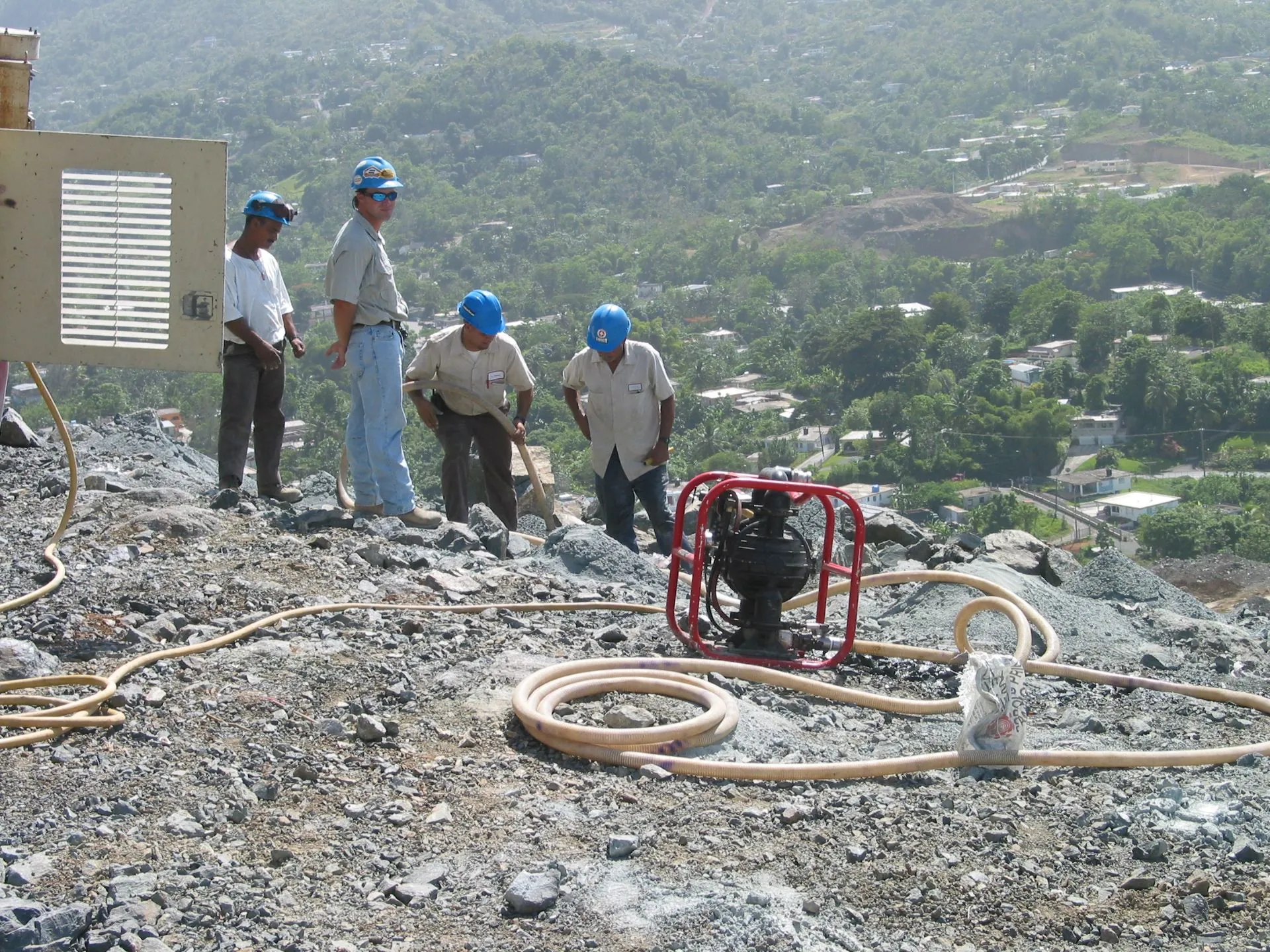 An early Dryrite unit on a hillside quarry shot with a four-man crew
